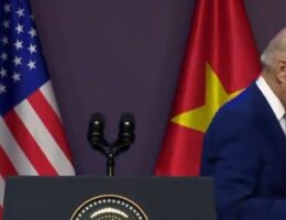 Old Joe Biden Gets Distracted, Bends Down to Fiddle with Something, Then Walks Out of Camera Frame While He is Being Asked a Question in Vietnam